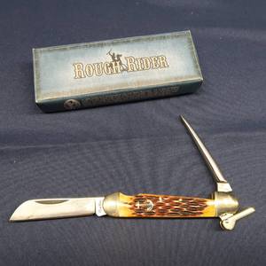 lot 55 image: ROUGH RIDER KNIFE RR 535 AMBER JIGGED BONE MARLIN SPIKE