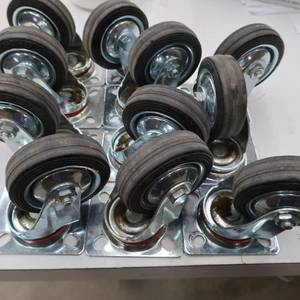 lot 111 image: 11 HEAVY DUTY METAL SWIVEL CASTERS