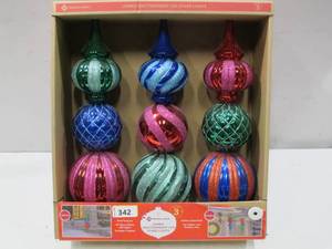 lot 342 image: Members Mark Set of 3 Jumbo OrnamentsLawn Stakes - Red, Green, Blue