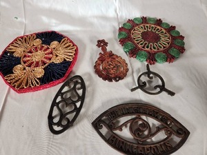 Variety of Trivets Including Iron and Woven - One from The JR Clark Co, Minneapolis