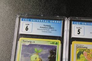 lot 56 image: Pokemon Graded Card Lot  3 Graded Cards