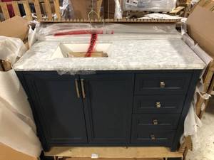 Home Decorators Collection Sandon 48 in. W x 22 in. D x 34.5 in. H Single Sink Bath Vanity in Midnight Blue with Carrara Marble Top Customer Returns See Pictures