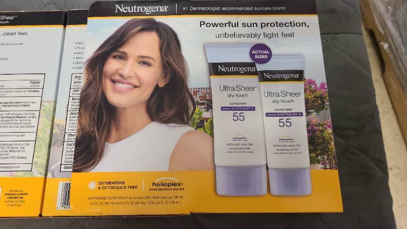 lot 559 image: 3 boxes of Neutrogena Sheer Touch 55 SPF sunscreen lotion