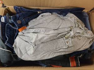lot 36 image: Box of Blue Jeans of Various styles and makes