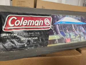 lot 83 image: Used Coleman Instant Eaved Shelter