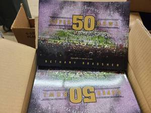 lot 25 image: 1 Box of High Quality Super Bowl 50th Anniversary Tribute Books