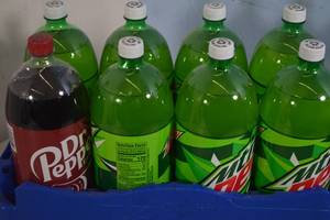 lot 74 image: 8ct 2 Liter Variety Soda Bottles, Mtn Dew, Dr Pepper