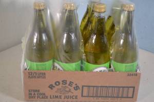 lot 132 image: 12ct Roses Sweetened Lime Juice from Concentrate