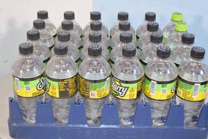 lot 144 image: Flat of Starry Lemon Lime Soda Regular and Zero Sugar 24ct