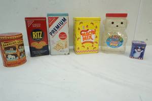 lot 62 image: Variety of Tins, Meow Mix, Ritz, Premium SAltine Crackers