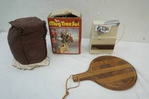 lot 66 image: 7 Pc mug set, Rival electric can opener, cutting board