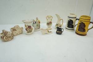 lot 84 image: Steins, vase decor, (2)Shawee ,