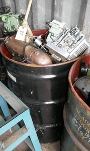 55 gal barrel full of commercial sewing machine parts