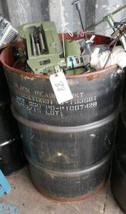 55 gal barrel full of commercial sewing machine parts