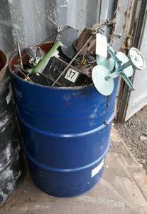 55 gal barrel full of commercial sewing machine parts