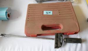 some type of repair kit and a torque wrench