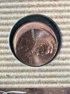 2000 US OFF CENTERED LINCOLN CENT IN INFO PAGE