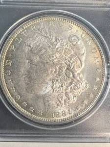1884-O US MORGAN SILVER DOLLAR TEXACO PACKAGE