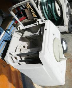 lot 73 image: Enclosed garden hose reel
