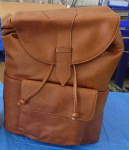 lot 93 image: Two brown travel backpack bags