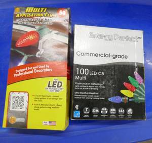 lot 139 image: New box of commercial grade christmas lights and new box of clips to hang your lights