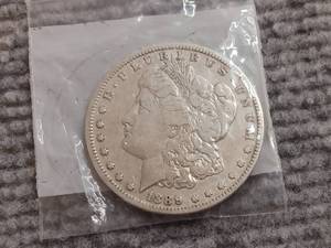 lot 28 image: 1889 O Morgan Dollar