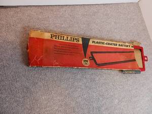 lot 119 image: Phillips 66 Plastic Coated Battery Hold Down