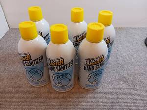 lot 120 image: (6) Blaster Hand Sanitizer Metal Cans
