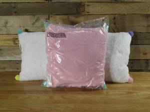 lot 79 image: Three Pom-Pom Pillows