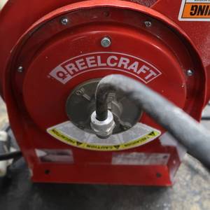 lot 47 image: REELCRAFT CORD REEL WITH HEAVY  EXTENSION CORD