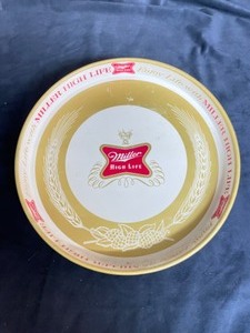 lot 106 image: Miller High Life beer serving tray, logo, tin