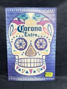 lot 129 image: Corona Extra Da de los Muertos  Day of the Dead skull tin tacker