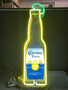 lot 27 image: Corona bottle with lime, neon