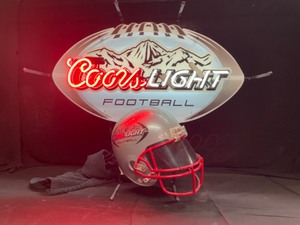 lot 28 image: Coors Light neon with Riddell football helmet