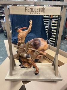 lot 18 image: Pendleton Whiskey cowboy and bronco store display