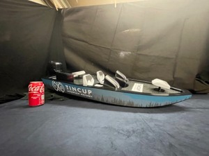 lot 19 image: Tin Cup Fishing Cup, Tin Cup Mountain Cup boat, store display