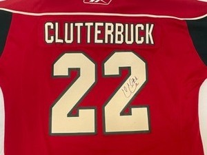 lot 35 image: MN Wild hockey jersey, autographed by Pascal  Cal Clutterbuck #22