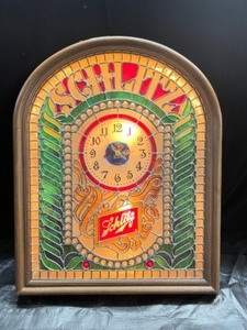 lot 87 image: Schlitz clock, faux stained glass light up with beveled jewels, works