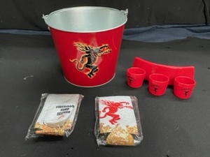 lot 174 image: Lot of Fireball Cinnamon Whisky Bar Necessities Ice Bucket, Shot glass holster, Shot Glass can Koozie