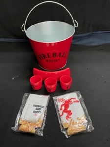 lot 175 image: Lot of Fireball Cinnamon Whisky Bar Necessities Ice Bucket, Shot glass holster, Shot Glass can Koozie