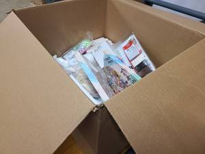 Box of craft and scrapbooking supplies