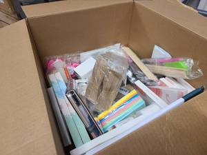 Box of craft and scrapbooking supplies