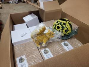 Box full of cute Turtle decor and Squirrel statuettes with other assorted goods