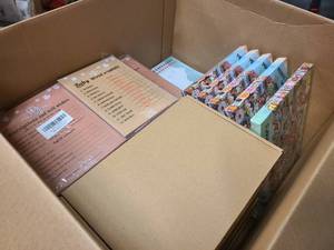 Box of scrapbooks and notebooks for resale or gifting