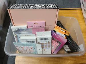 Tray of stick on nails and nailcare goods