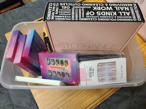 Tray of stick on nails and nailcare goods