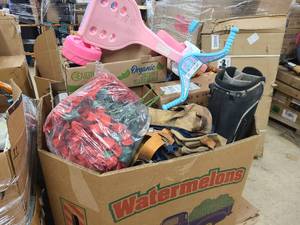 Large Pallet Lot of previous unsold or unclaimed auction items
