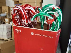 Box of 30-40 Red or Green Candy Cane Light Up Decorations for outdoors or indoors.