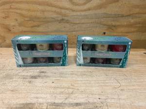 lot 64 image: YAHKEE CANDLE Lot of 2- Candle Sets (6 per set)