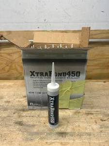 lot 67 image: PREMIER BUILDING SOLUTIONS Lot of 23 Tubes of- Xtra Bond 450 Neutral Cure Silicone Sealant- Clear